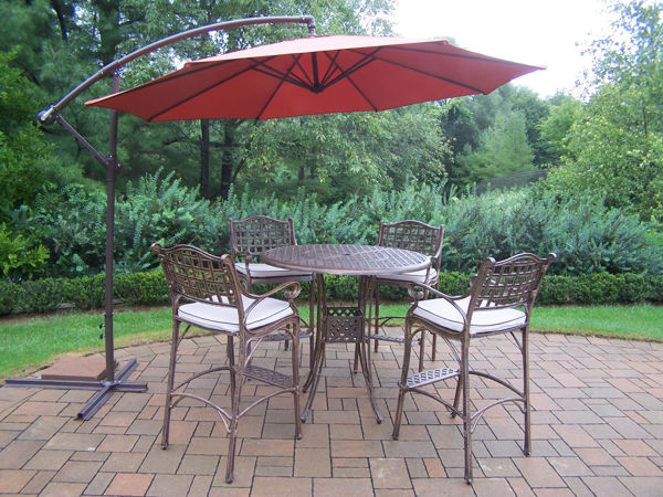Picture of Elite Cast Aluminum 6 Pc. Bar Set includes a 42-inch table, 4 Cushioned Bar Stools with Foot-Rests, and 10 ft. Cantilever Umbrella with Base - Antique Bronze