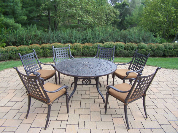 Picture of Belmont Aluminum 7 Pc. Patio Dining Set includes 54-inch Round Table, 6 Stackable Chairs, with fade and mildew resistant Sunbrella fabric Cushions - Aged