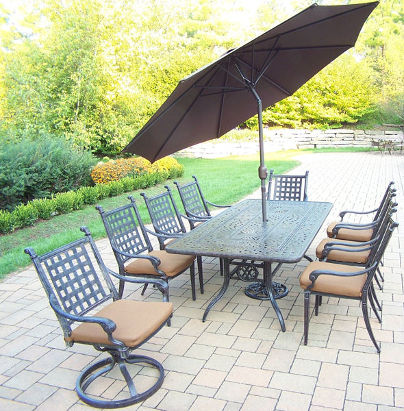 Picture of Belmont Aluminum 11 Pc. Patio Dining Set includes 84 x 42-inch Rectangular Table, 6 Stackable Chairs, 2 Swivel Rockers, with fade and mildew resistant Sunbrella fabric Cushions, 9-ft. Tilt & Crank Metal framed Umbrella, and Metal Stand - Aged