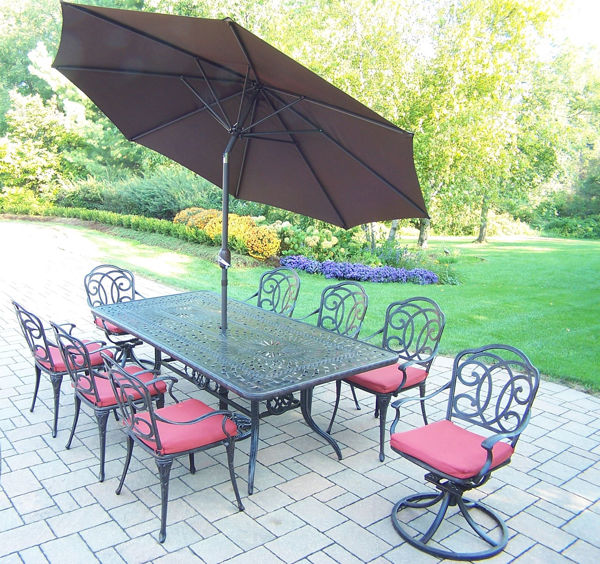 Picture of Berkley Aluminum 11 Pc. Patio Dining Set includes 84 x 42-inch Rectangular Table, 6 Chairs, 2 swivel Rockers, durable spun polyester Cushions, 9-ft. Tilt & Crank Metal framed Umbrella, and a cast metal Stand - Aged
