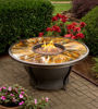 Picture of 48 x 24-inch Moonlight Round Gas Firepit Table with Tempered Fiberglass Top, Burner, Glass Beads, Weather Cover, Lazy Susan Cover, and Aluminum Frame. The Set including four Deep Seating Rust-free Aluminum Rocking Chairs and thick cushions in 100-percent